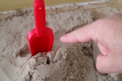We are playing with sand..
